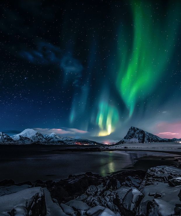 Northern Lights over the Mountains at Night
